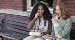Girl Scouts trying Adventurefuls cookies together